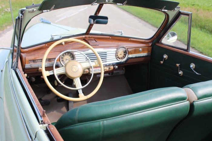 The inside sports a woodgrained dashboard and window sills.